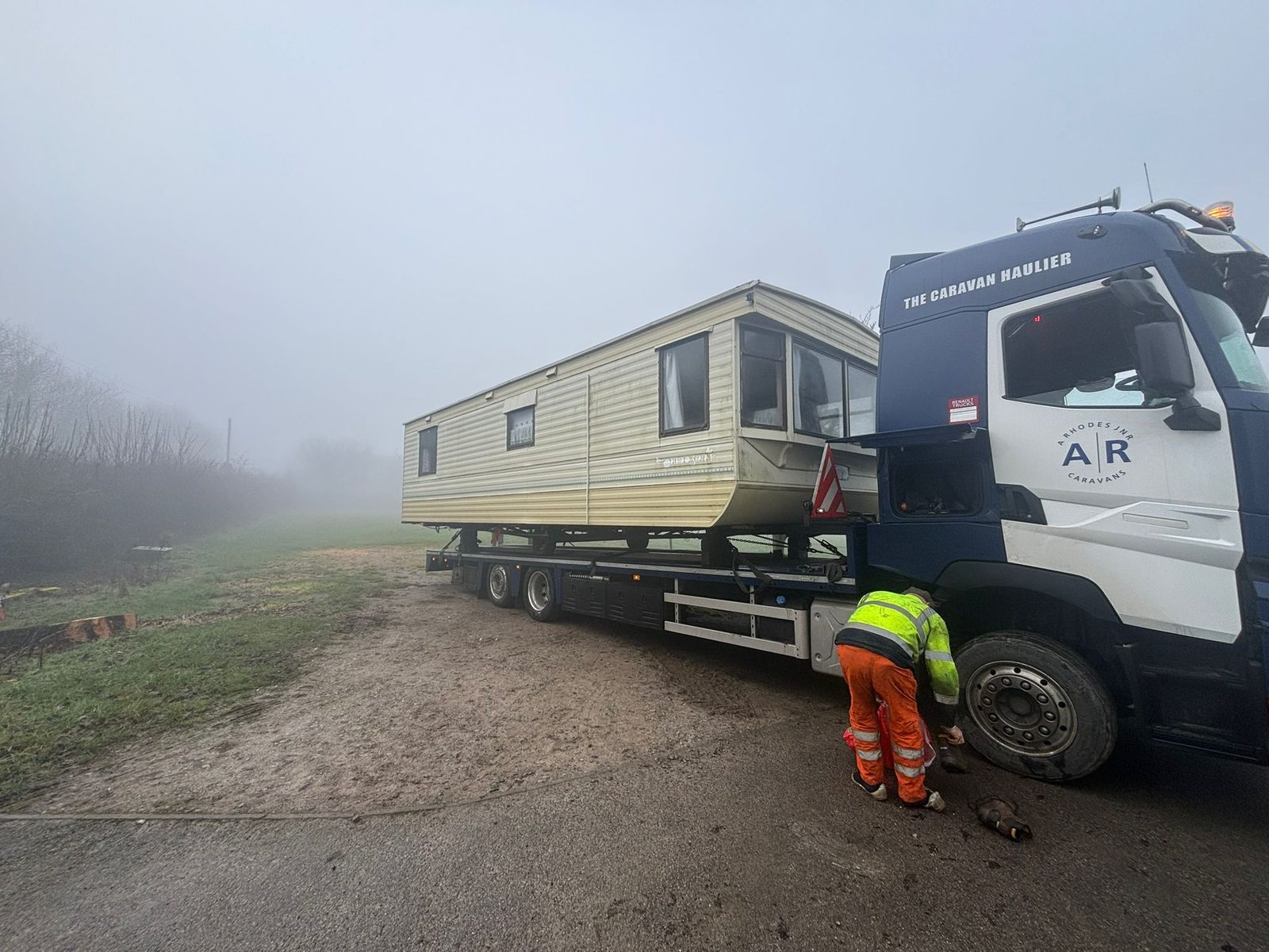 Static caravan loaded on a specialist haulage lorry ready for transport